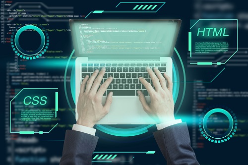 Imagen de notebook escribiendo cóodigo html